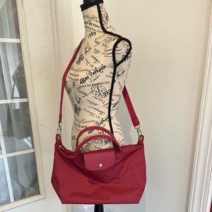 Longchamp crossbody raspberry color